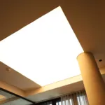 Aikad Group — éclairage LED, plafond bois